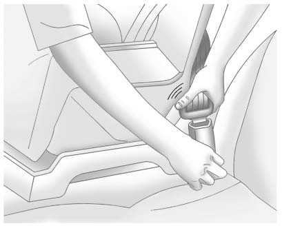 Latch plate inserted into the buckle while securing a rear seat child restraint