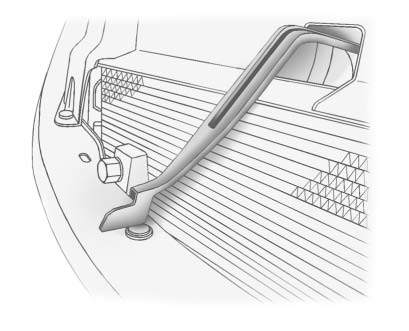 Secondary hood release at the front grille for opening the hood