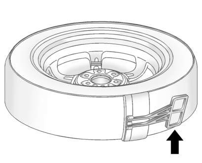 Removing plastic spare tire heat shield before installing compact spare