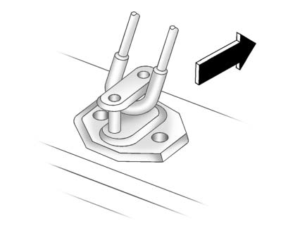 Centering metal tube at door striker for flat tire storage