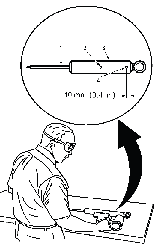 Shock absorber tube drilling point for safe disposal procedure