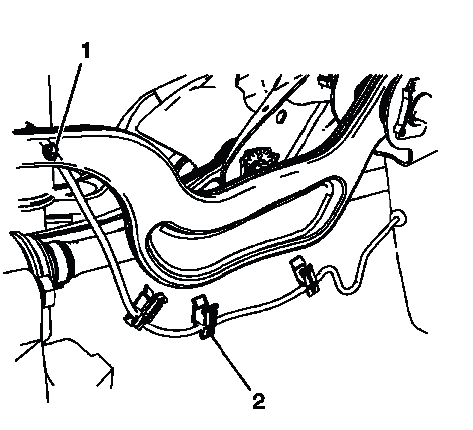 Speed sensor harness retaining clips installed on rear upper control arm