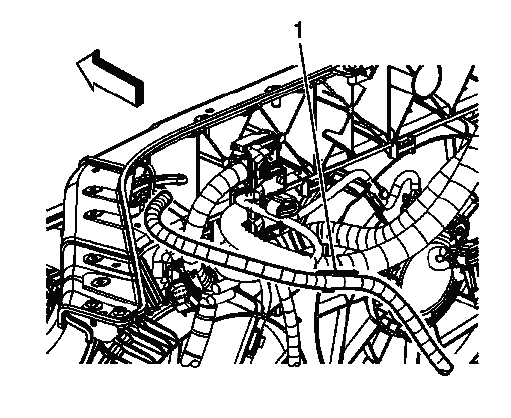 Coolant heater cord positioned along engine wiring harness