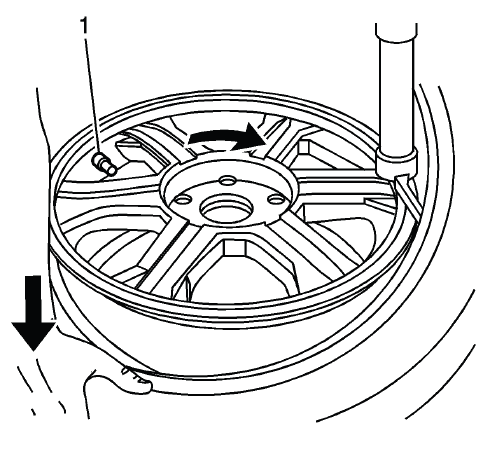 Valve stem held at 7 o'clock during tire bead installation
