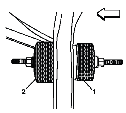 Bushing installation tools positioned inside and outside the frame