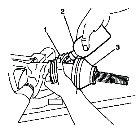 Applying lubricant into the tripot housing boot during CV joint service