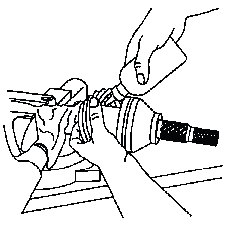 Adding service kit grease into the outboard CV boot and seal area